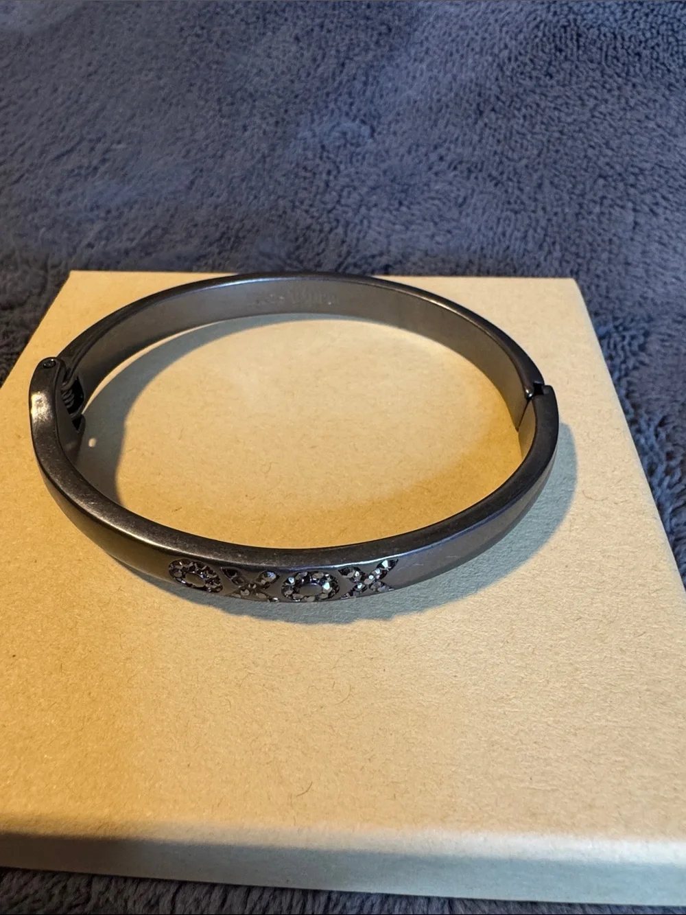 XOXO Black Crystal Accent Gun Metal Bangle